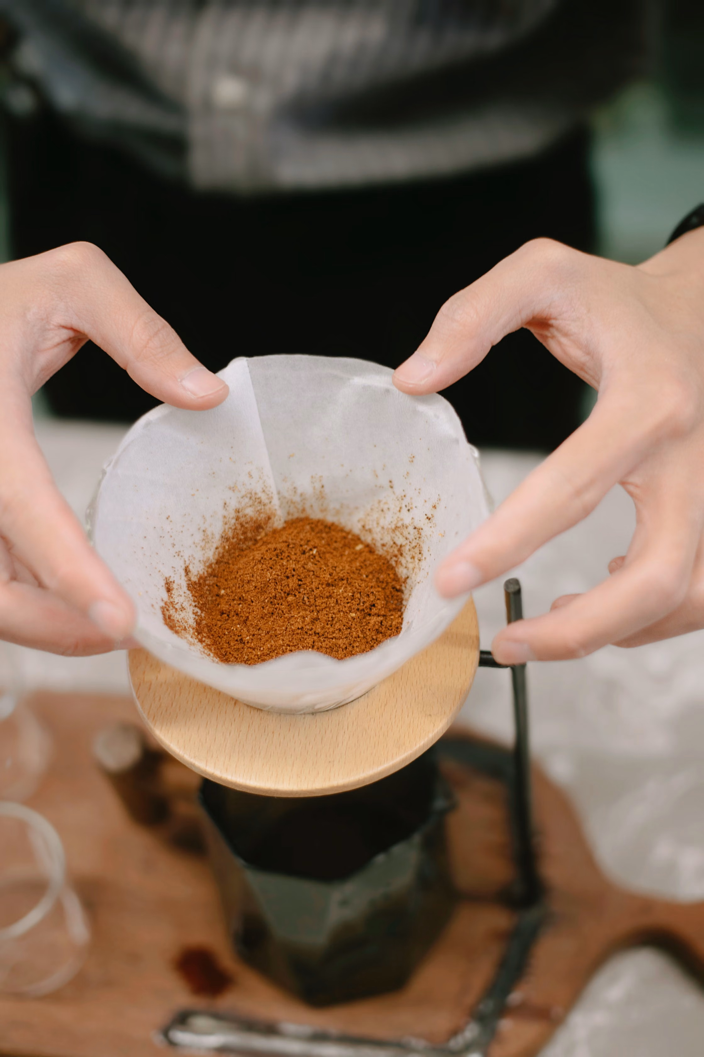 Barista brewing coffee with precision